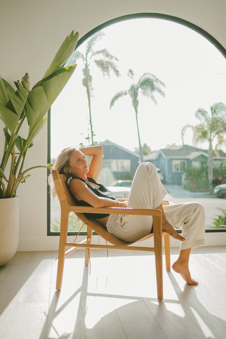 Confident woman in transformation showing before and after identity shift for 2026 glow up journey