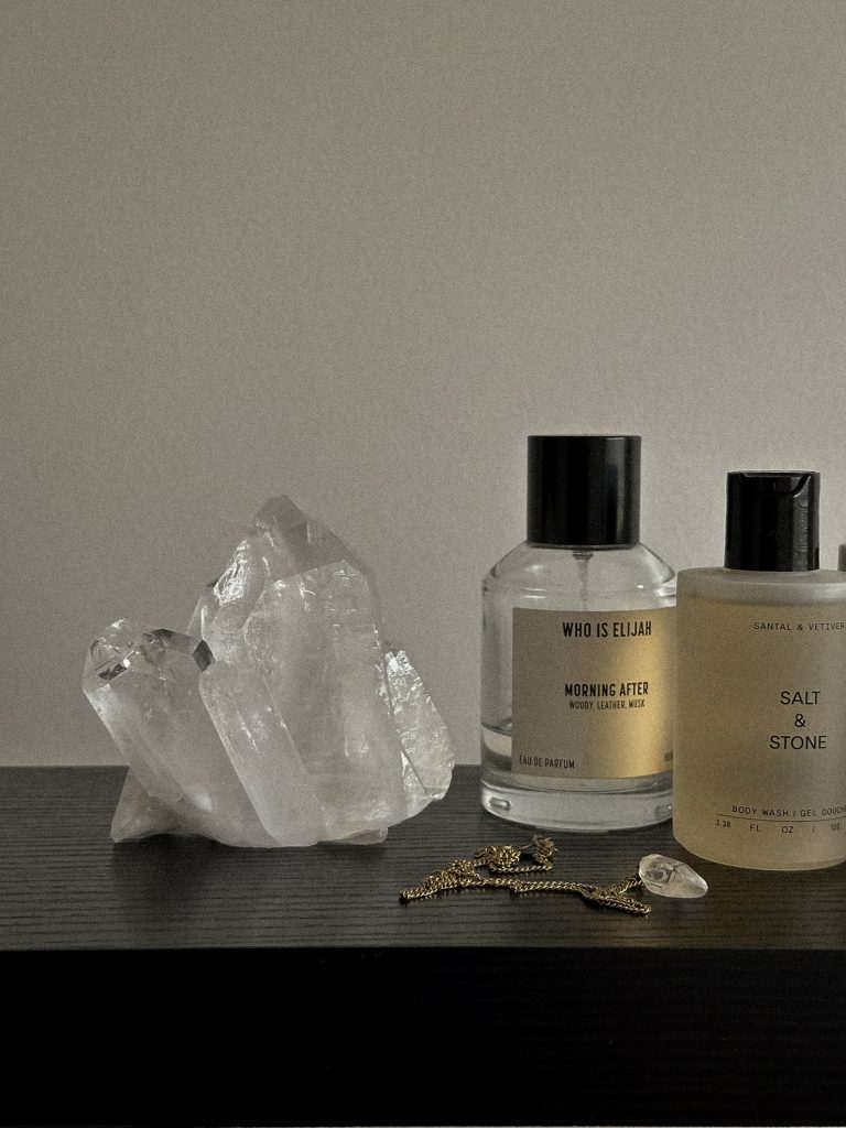 Woman creating lucky girl 2026 vision board with identity transformation themes for manifestation and subconscious reprogramming