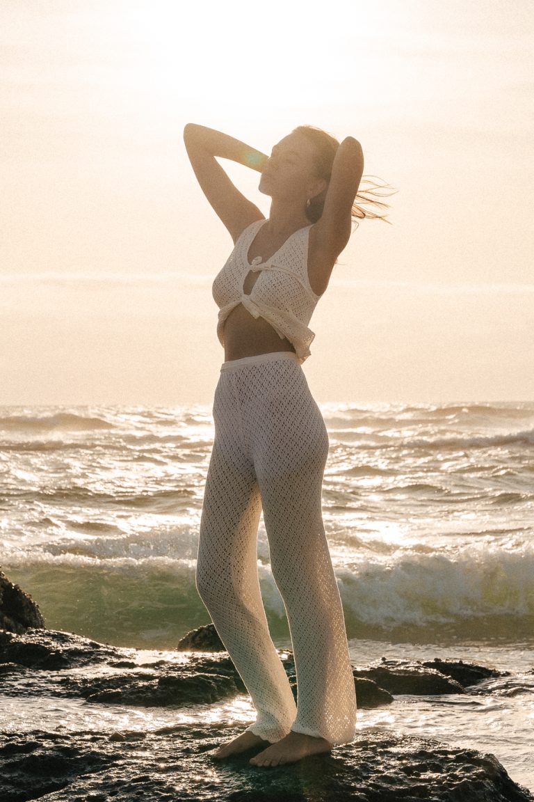 Woman embodying her vision board and coffee, planning her 2026 main character energy transformation journey