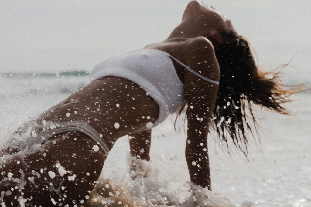 Woman embodying lucky girl syndrome mindset and 2026 productivity goals through identity transformation