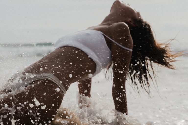 Woman embodying lucky girl syndrome mindset and 2026 productivity goals through identity transformation